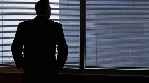 Businessman, silhouette, windows — Top Payment Gateways That Work Seamlessly with Jeetwin