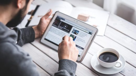 Man, reading, touchscreen — When to Fold, Call, or Raise in Holdem Poker